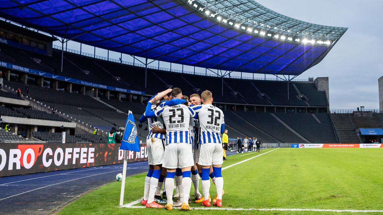 The team celebrate at the Olympiastadion.