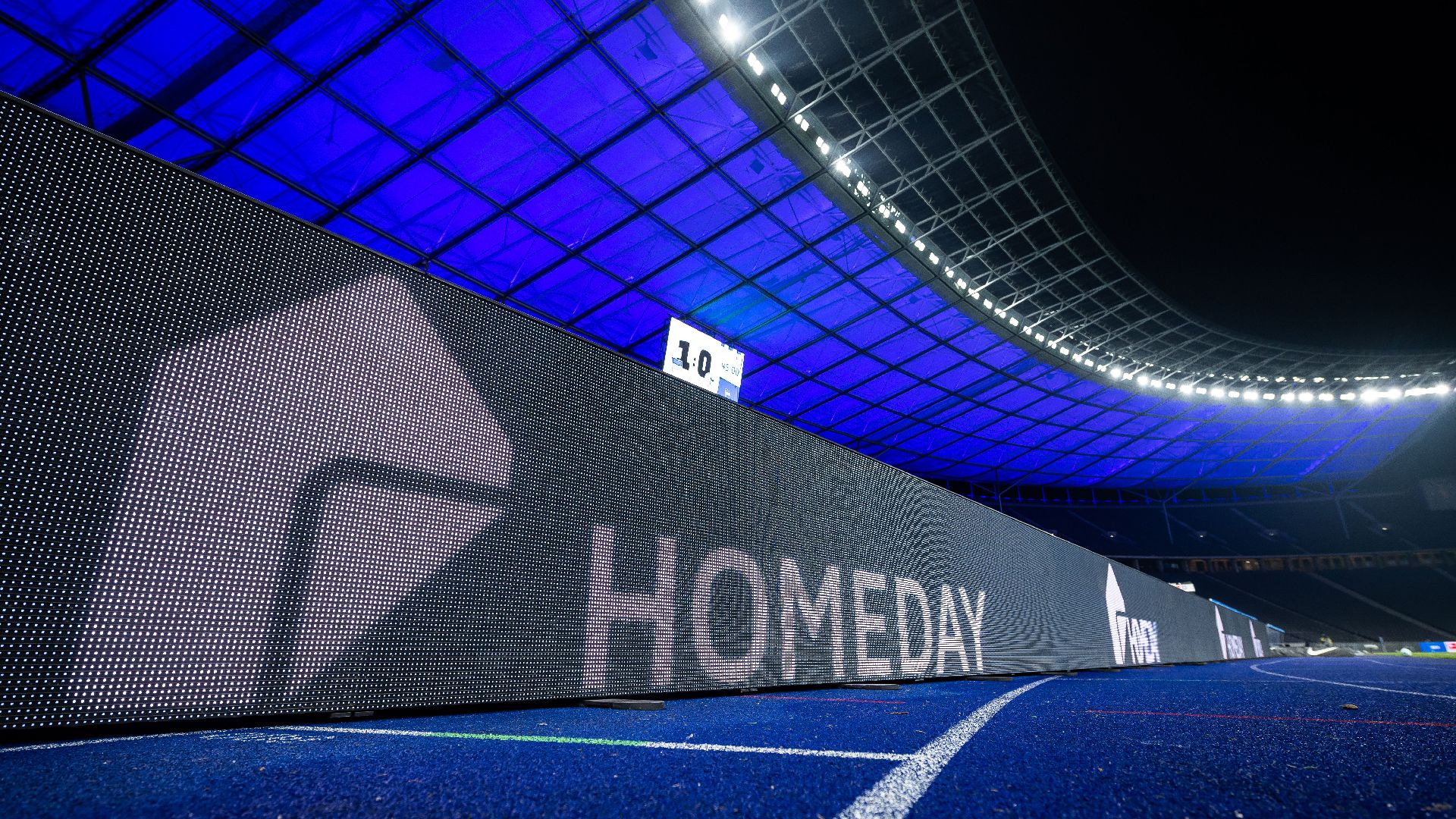 Homeday's logo on the advertising board at the Olympiastadion.