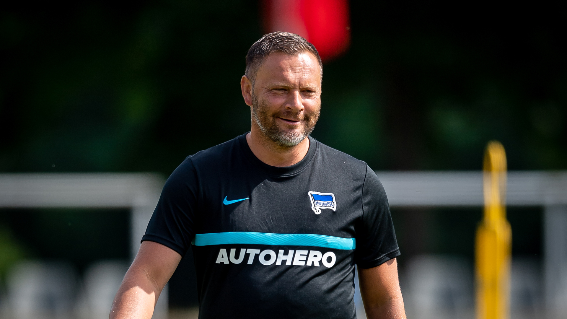 Pál Dárdai smiling at training.