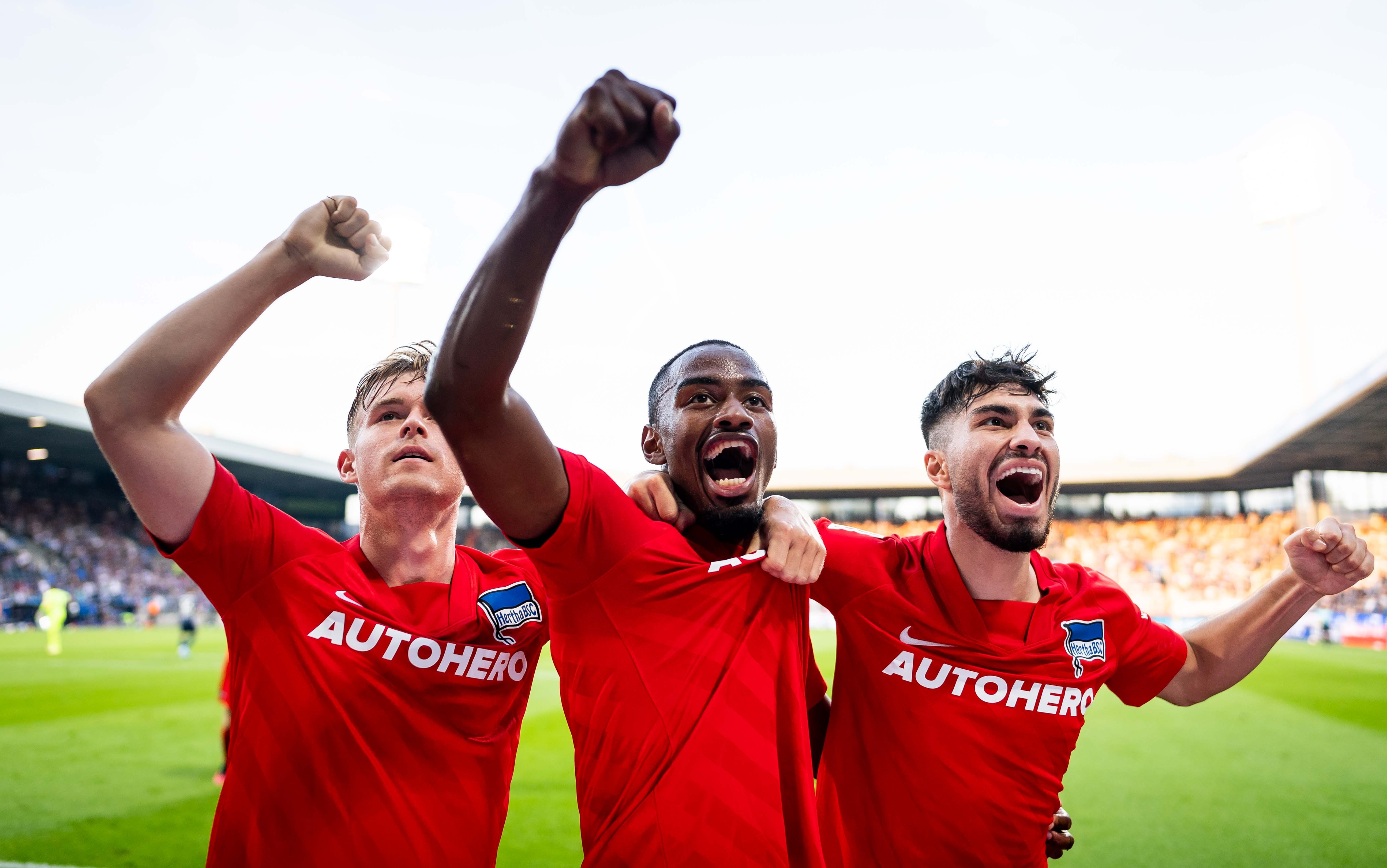 The goalscorers celebrate their third against VfL.