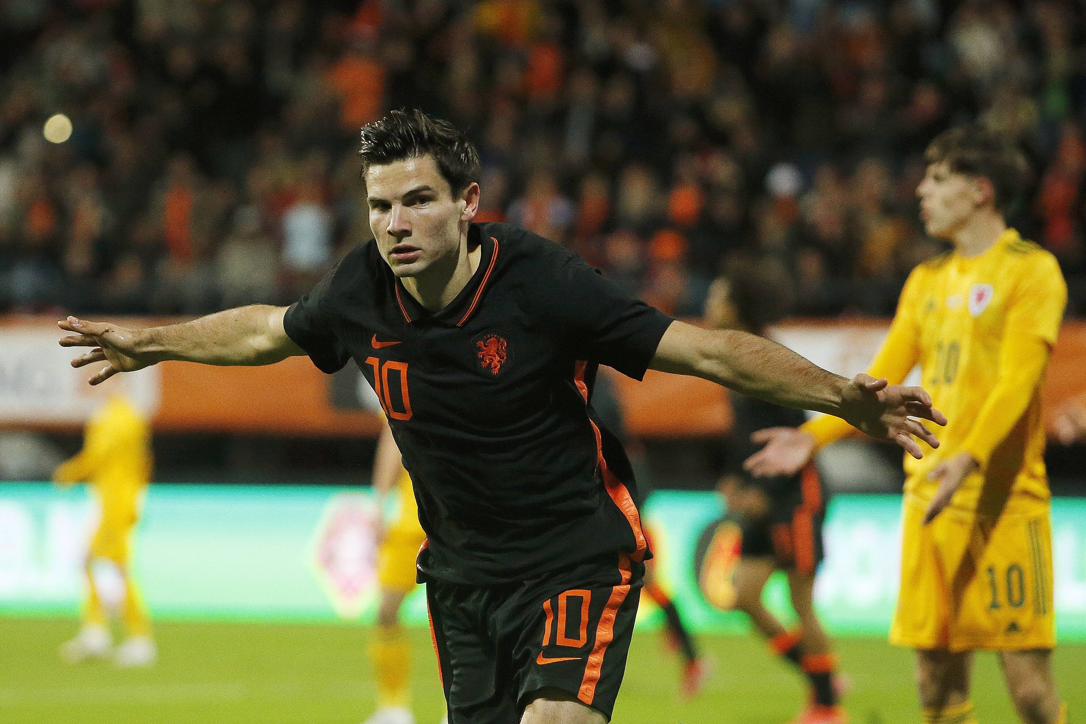 Jurgen Ekkelenkamp celebrates after scoring.