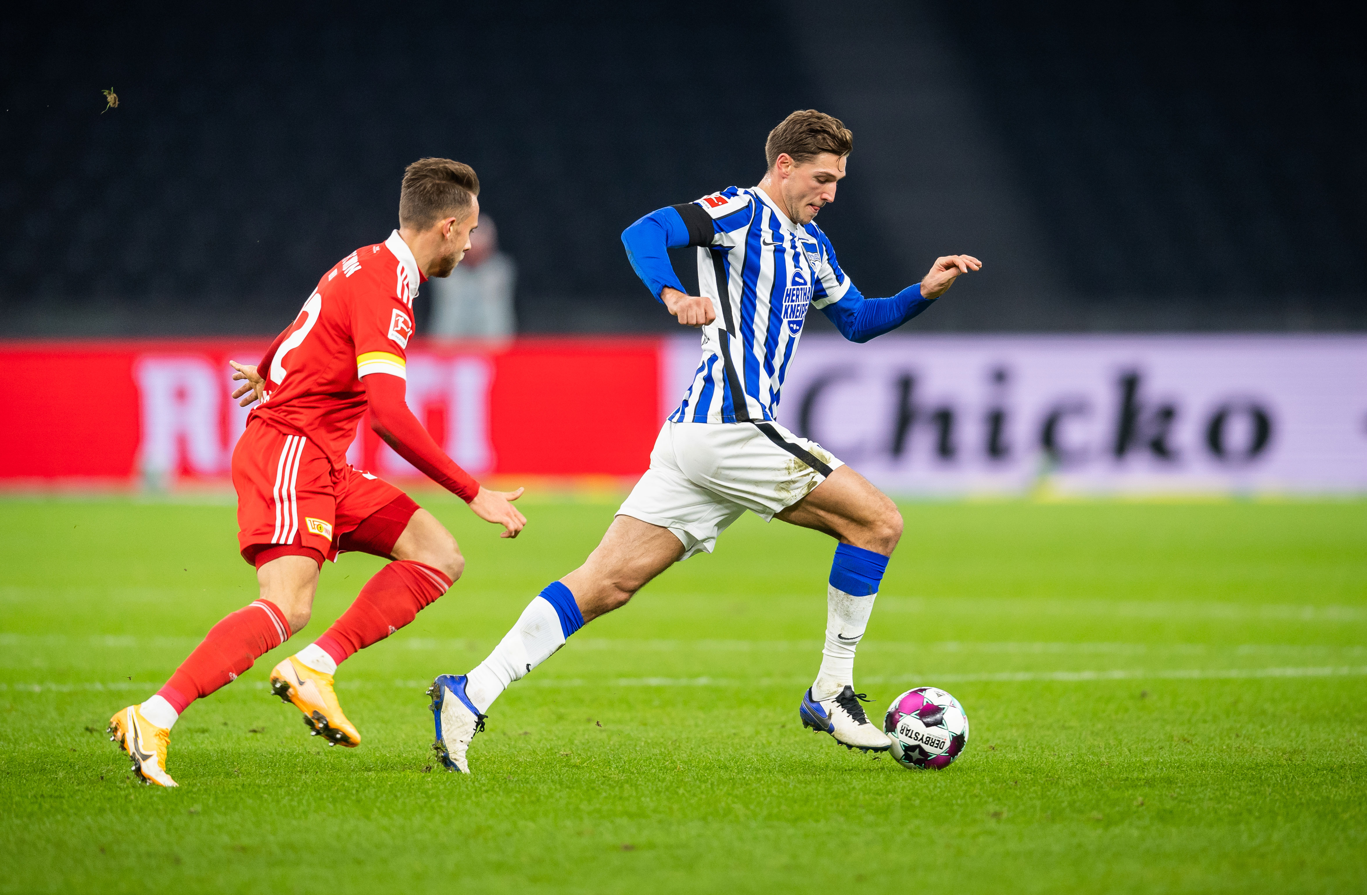 Niklas Stark sees off Union's Marcus Ingvartsen during last season's derby.