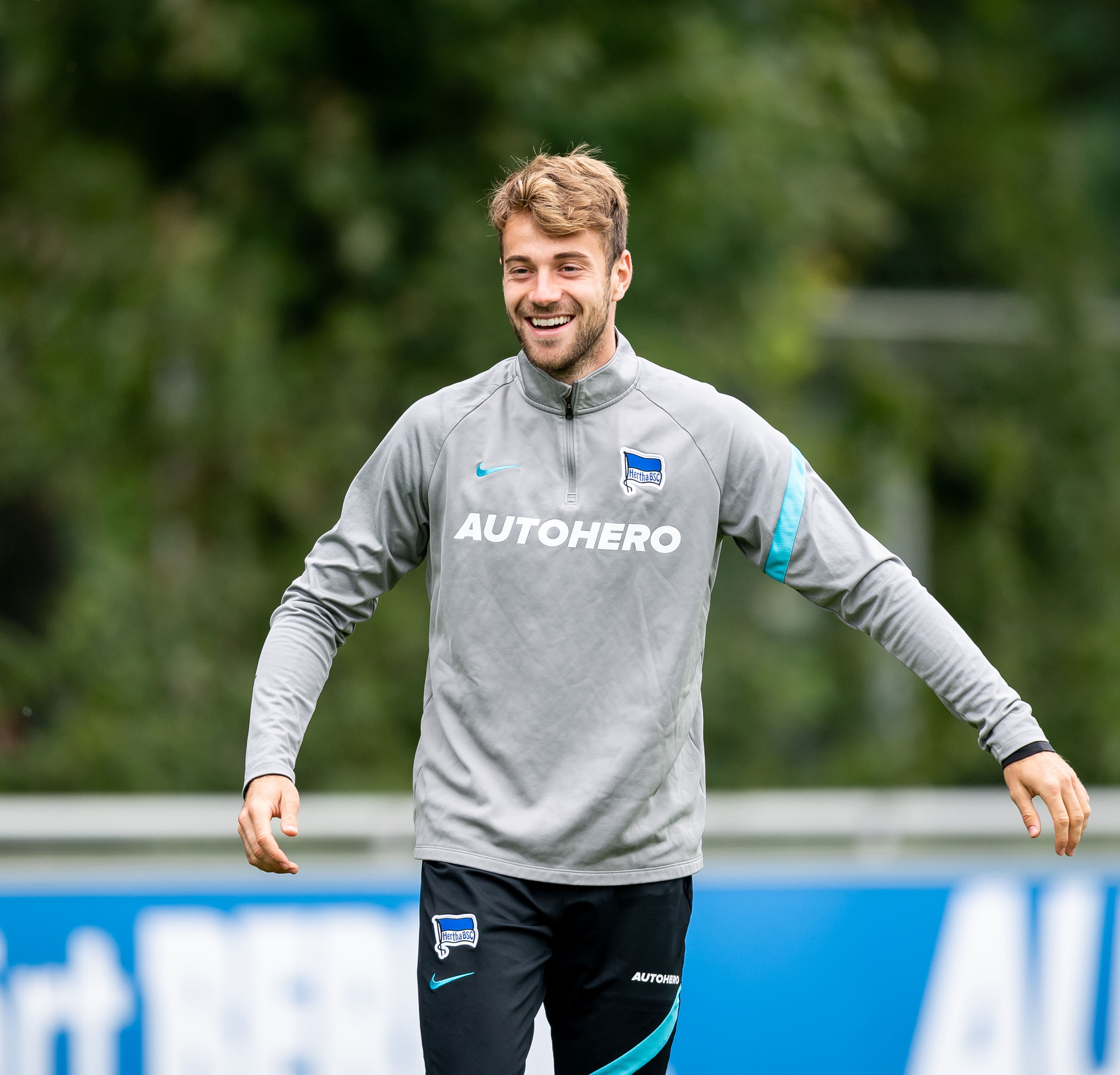 Lukas Klünter smiling at training.