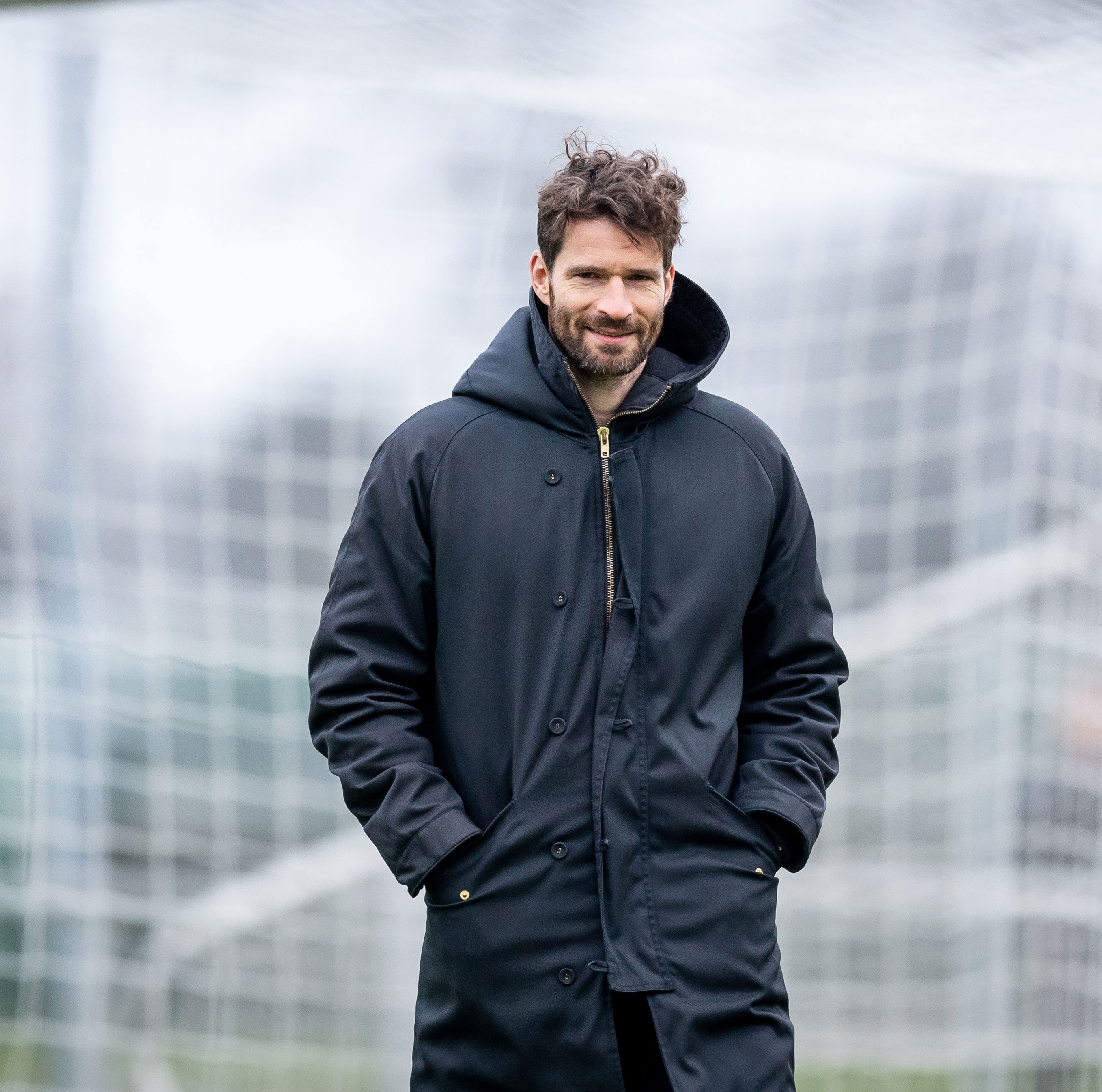 Arne Friedrich looks on at the training ground.