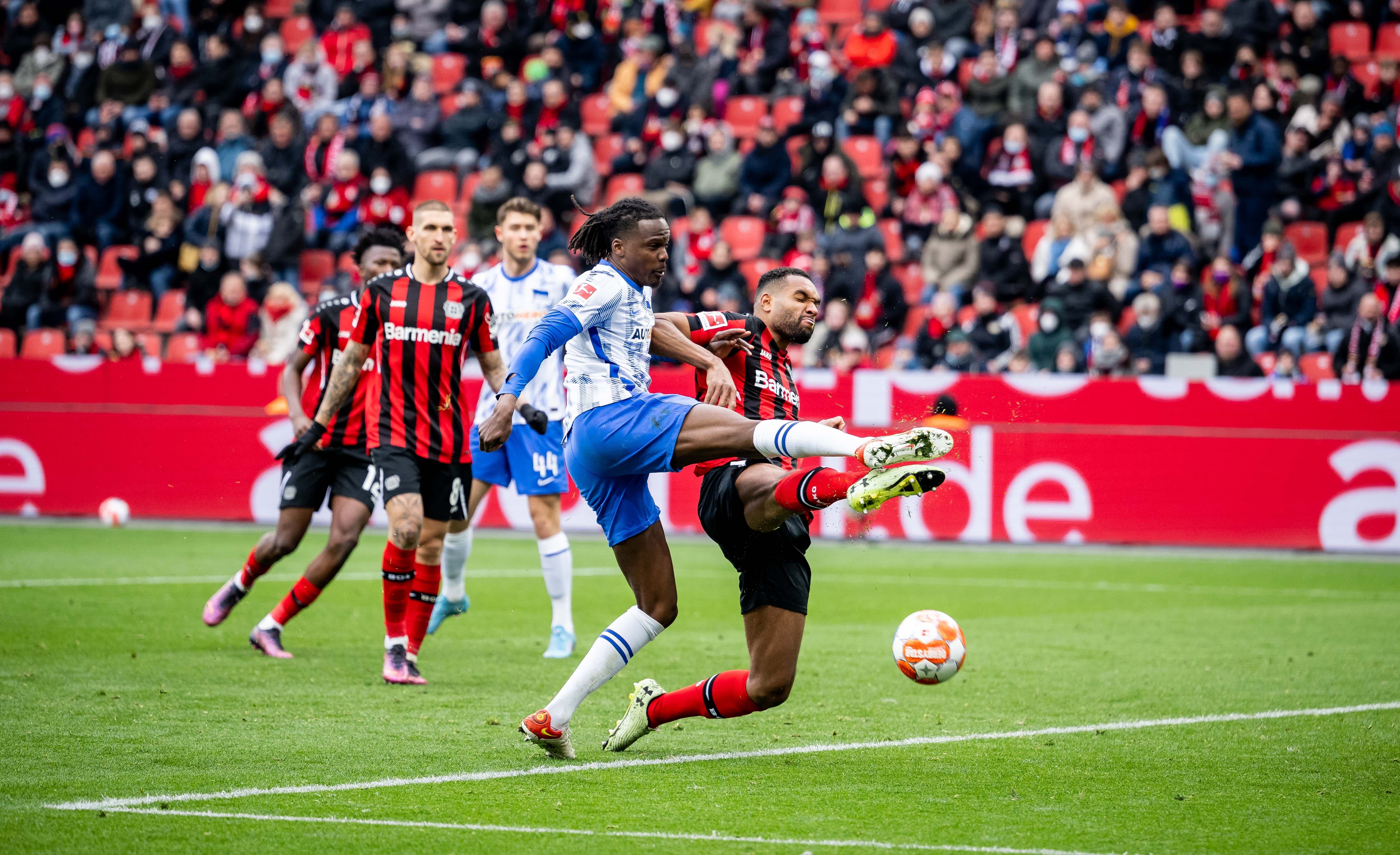 Dedryck Boyata faces off against Jonathan Tah.