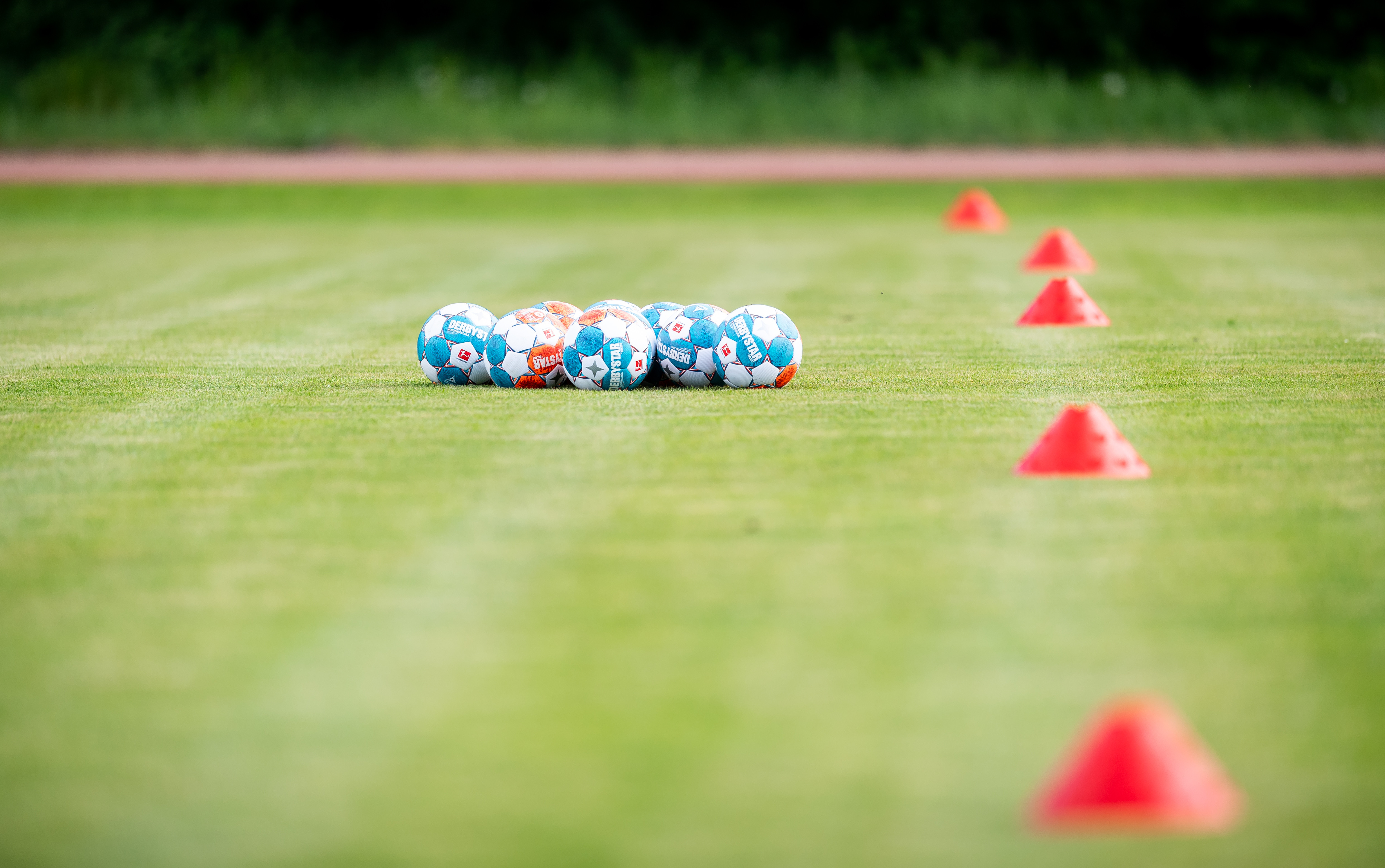 Cones and balls on the training pitch.