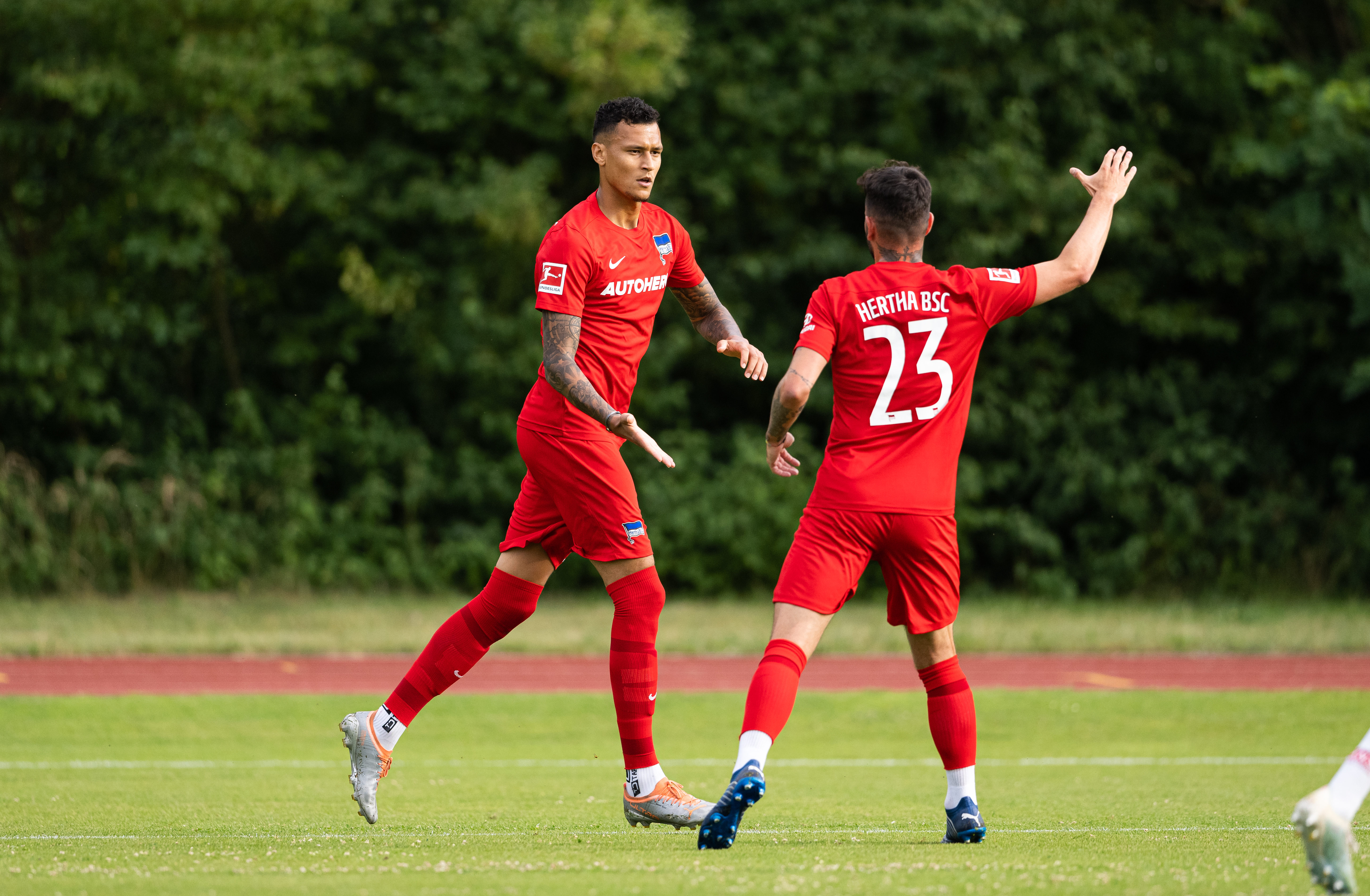 Davie Selke celebrates his second goal with Marco Richter.