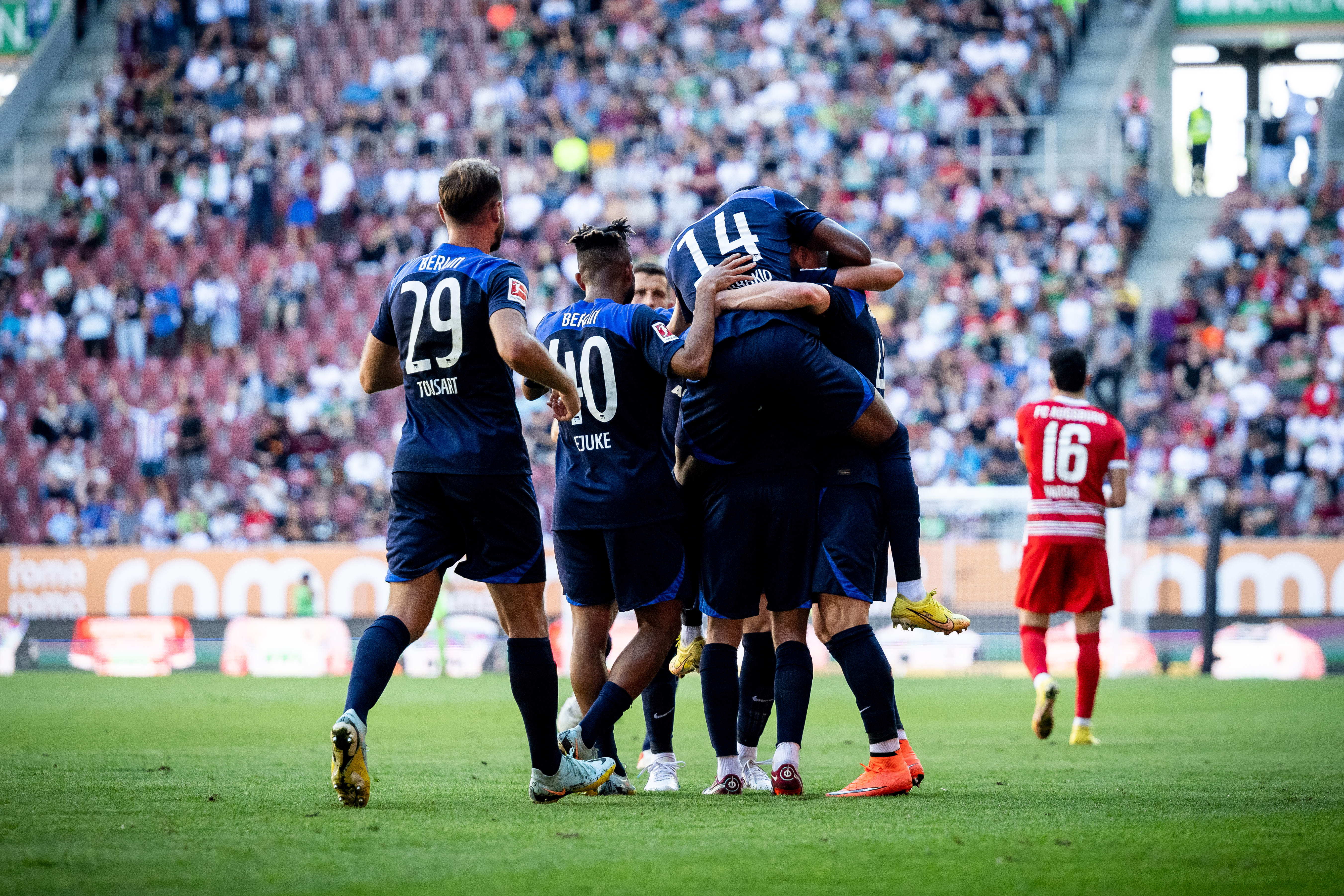 Hertha players celebrating Dodi Lukébakio's goal