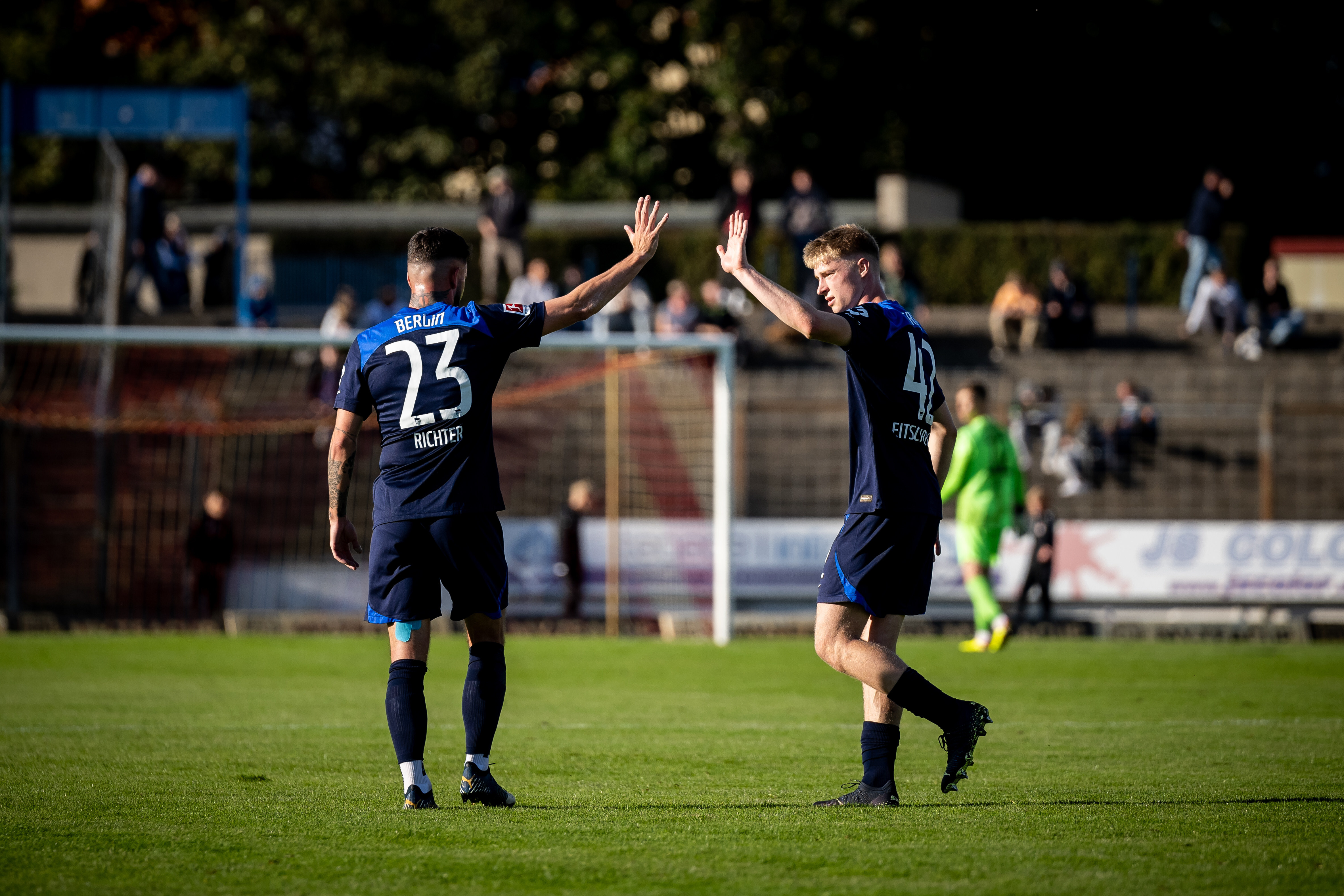 Marco Richter and Julian Eitschberger celebrate a goal