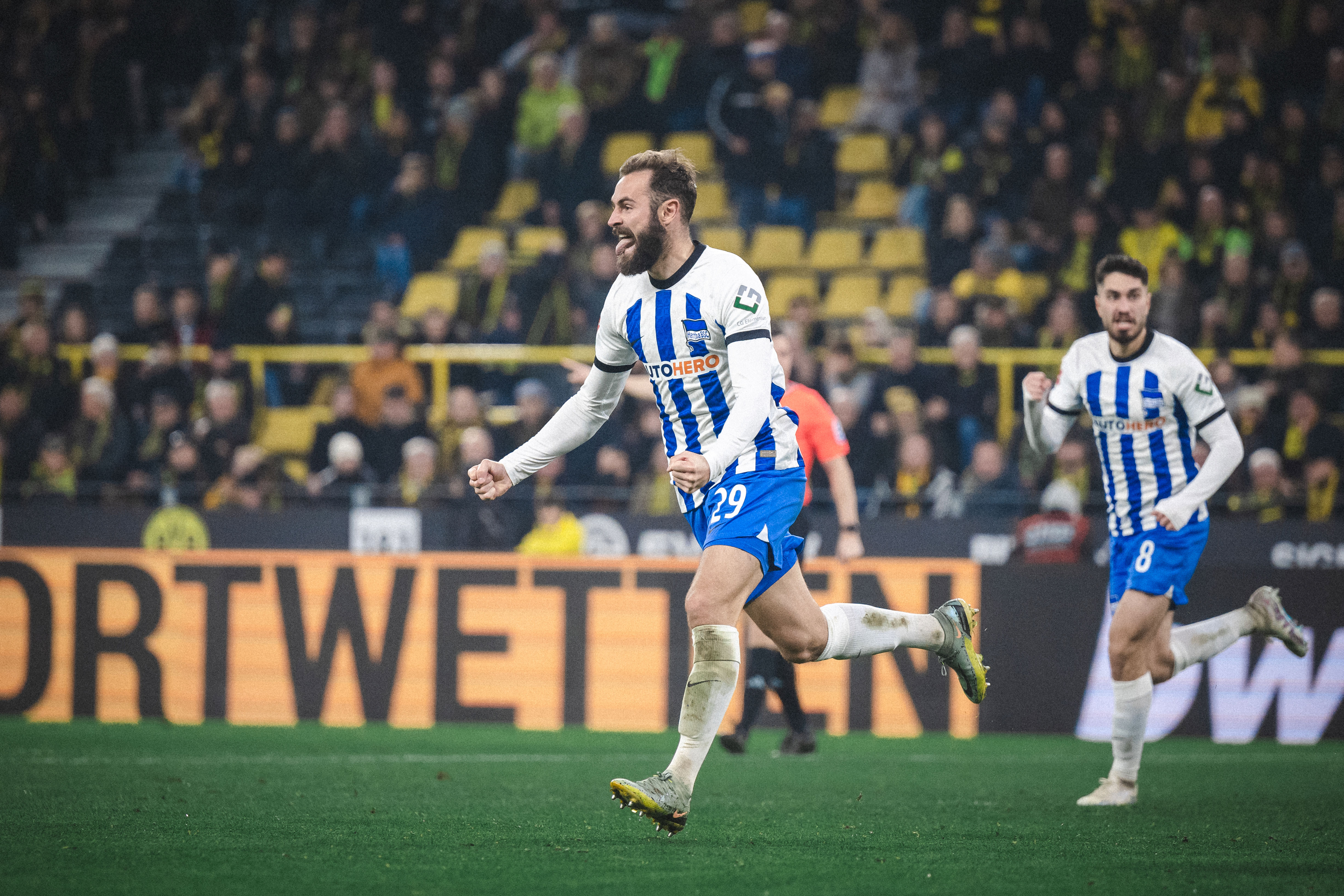 Lucas Tousart celebrating his goal against Dortmund.