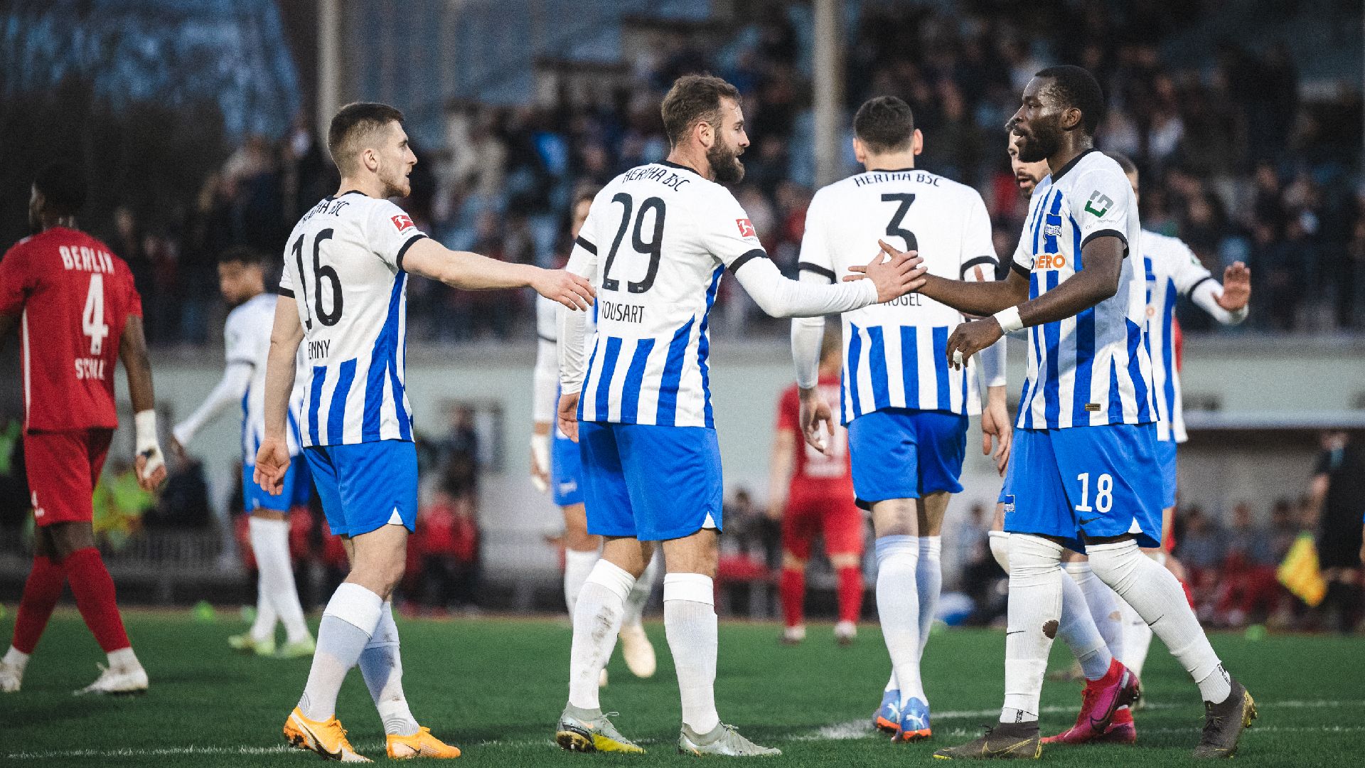 The Blue-Whites celebrate a Wilfried Kanga goal.