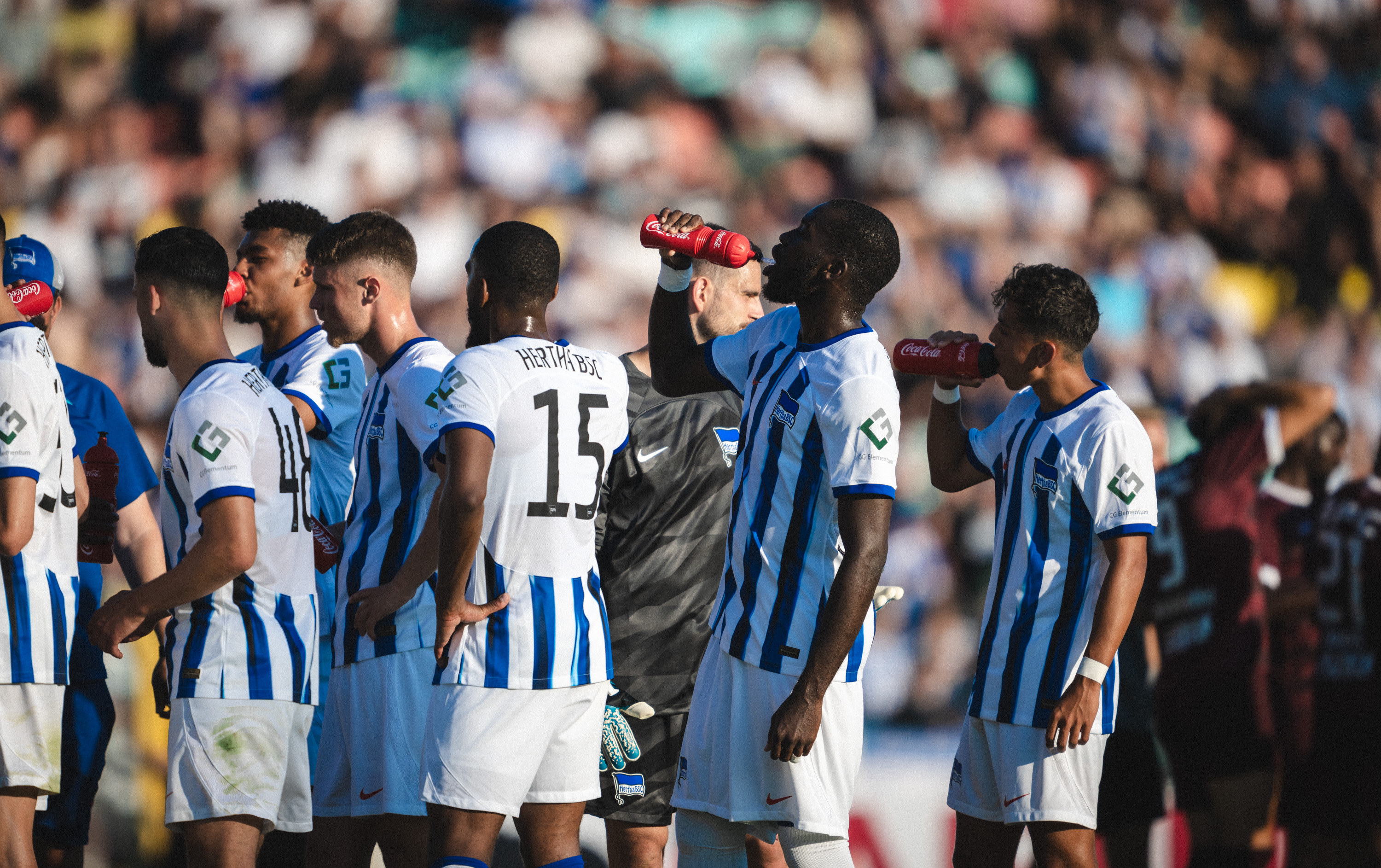 The Hertha players take a drink during the friendly against BFC Dynamo.