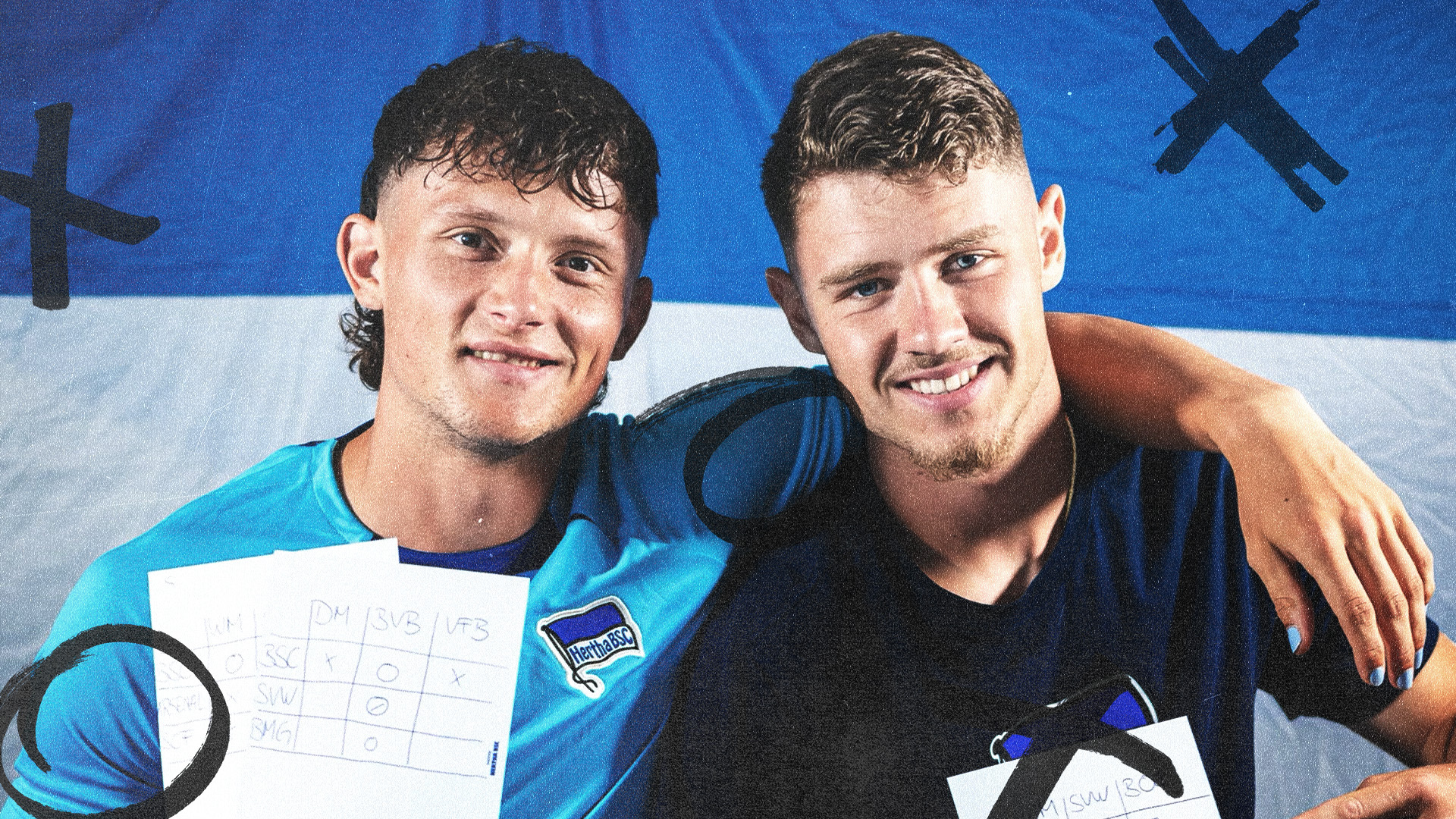 Fabian Reese und Linus Gechter blicken lächelnd in die Kamera.