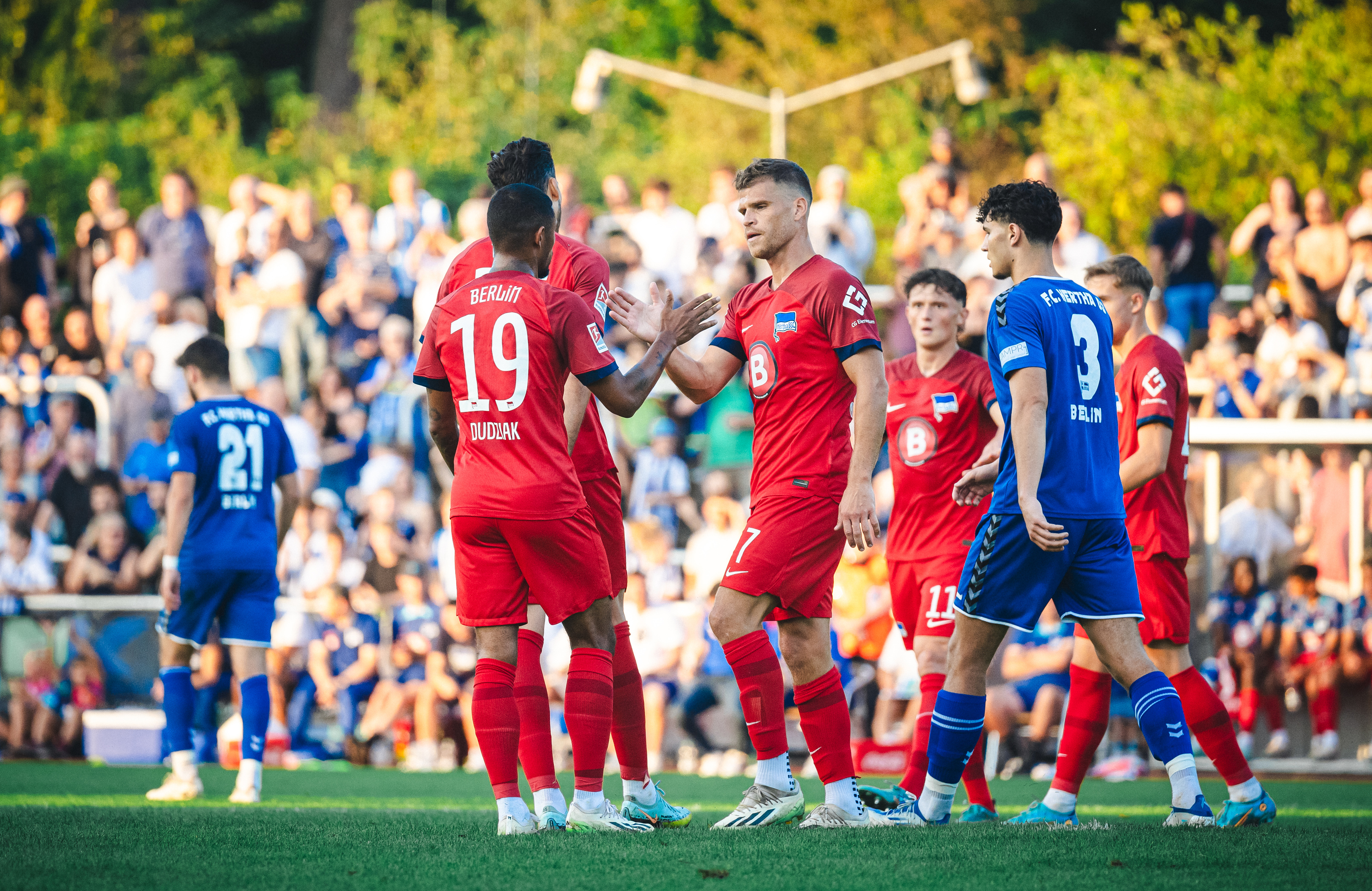 Dudziak and Niederlechner celebrate the opening goal.