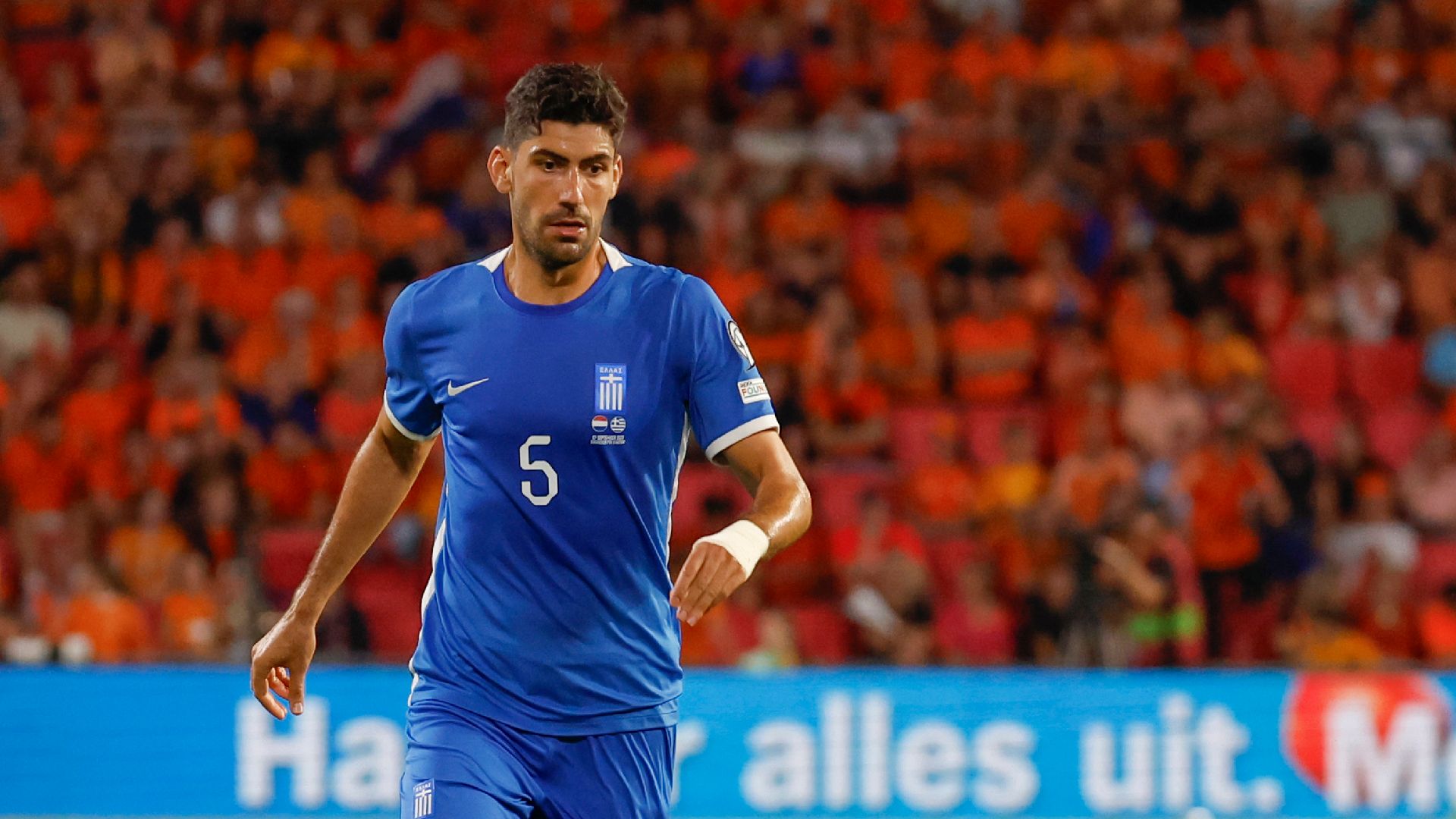 Andreas Bouchalakis taking on a player.