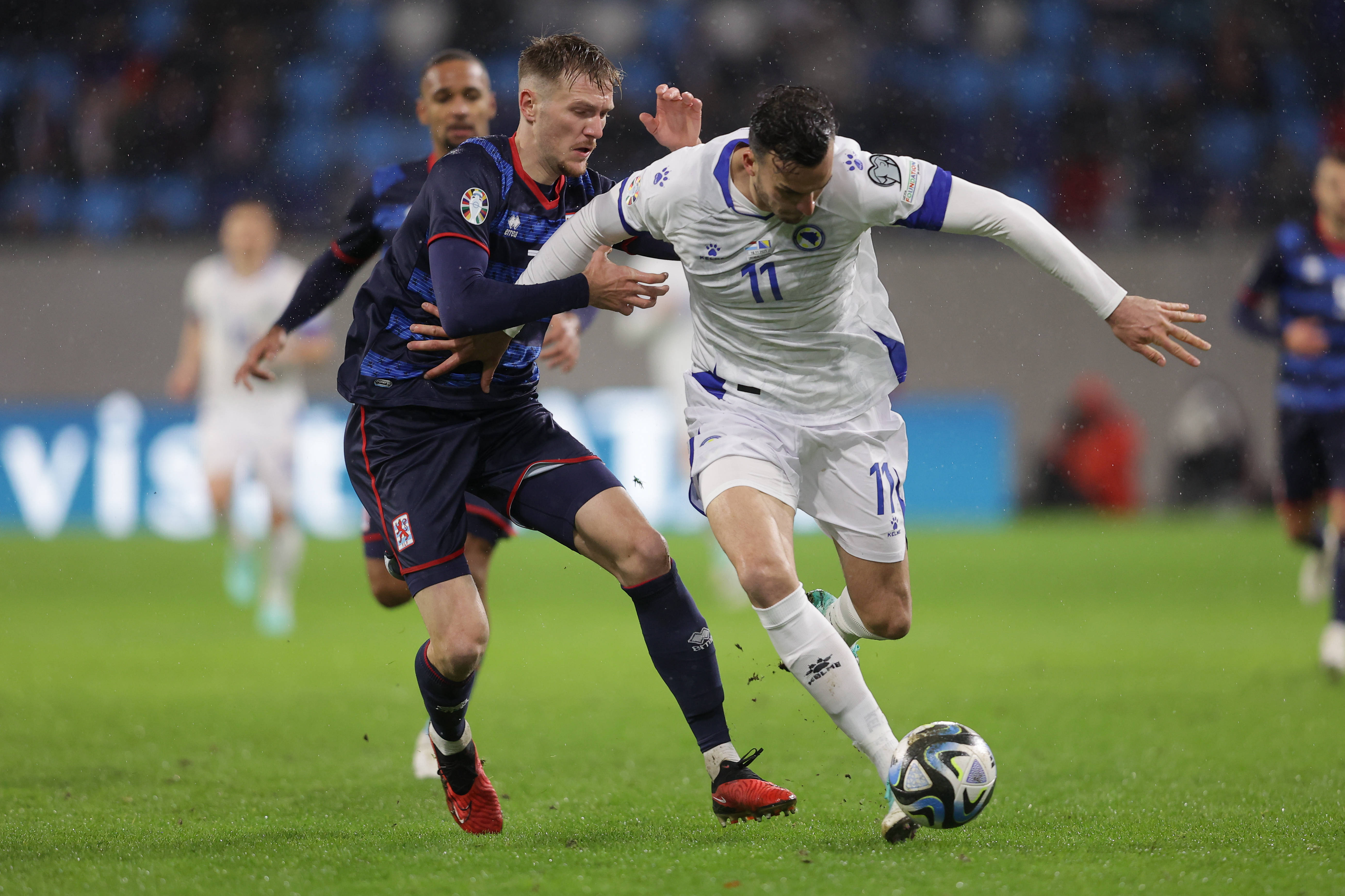 Haris Tabaković on the ball during his Bosnia debut against Luxembourg.