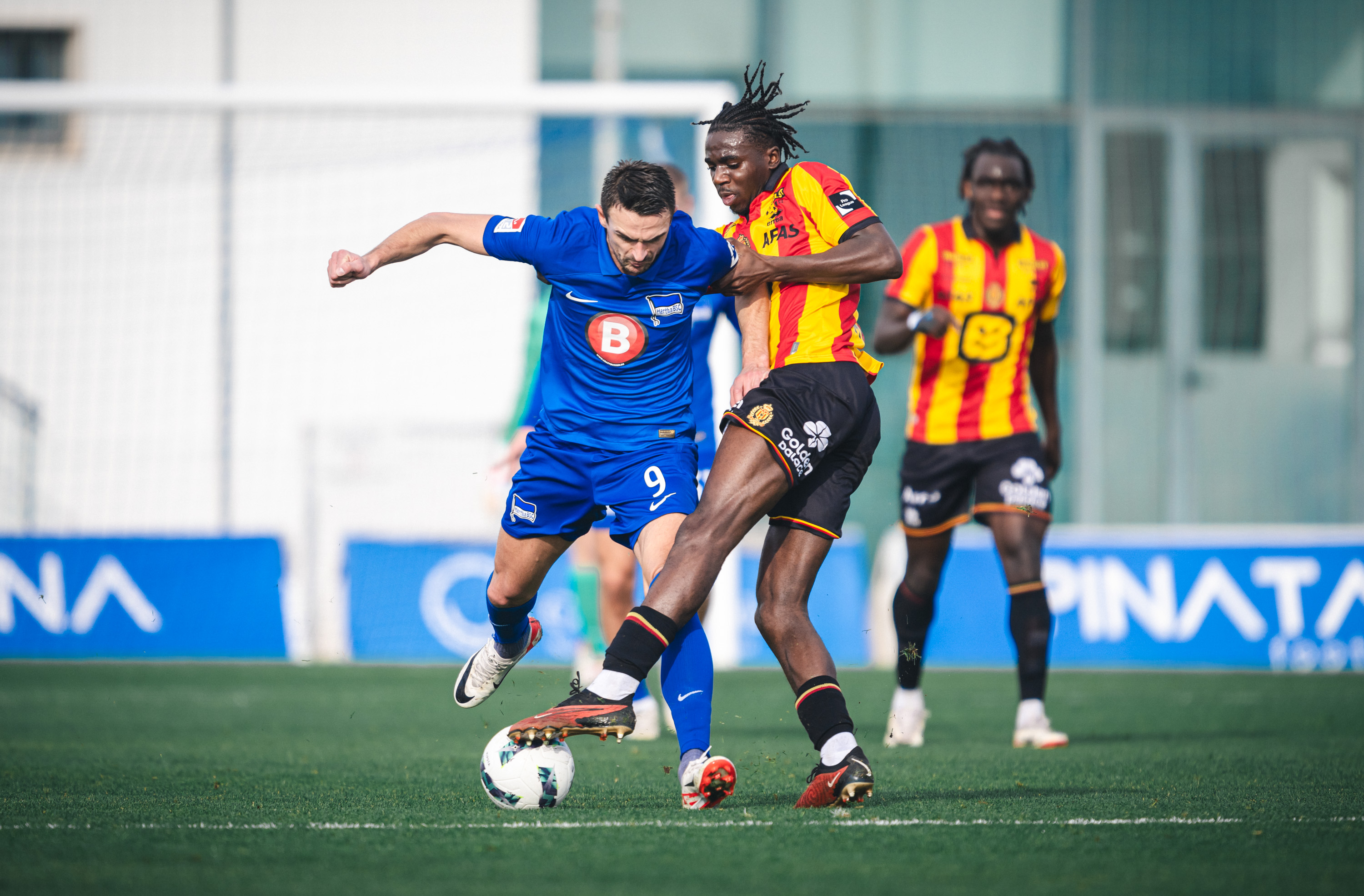 Smail Prevljak tackles a Mechelen player.
