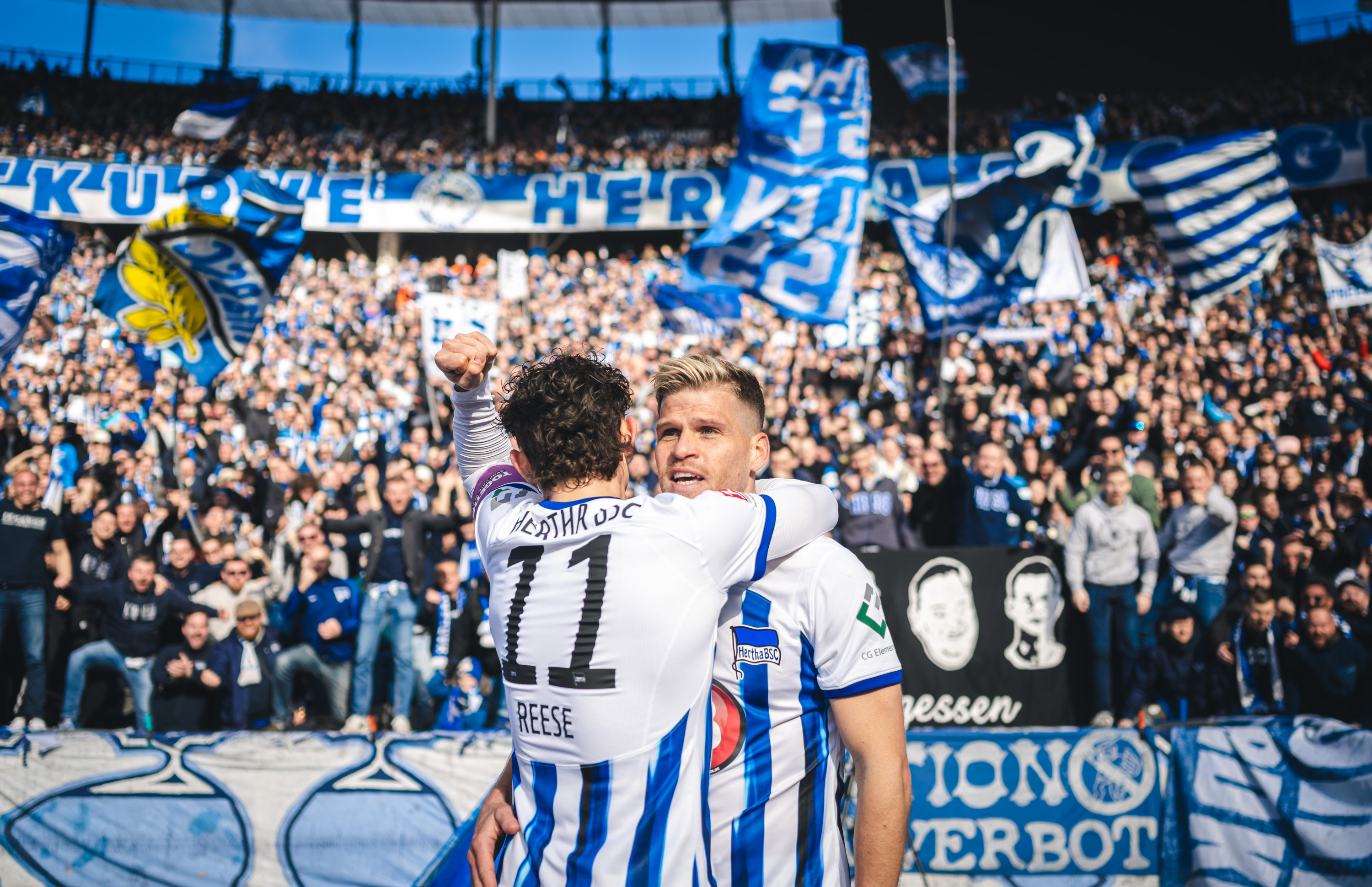 Fabian Reese embraces goalscorer Florian Niederlechner.
