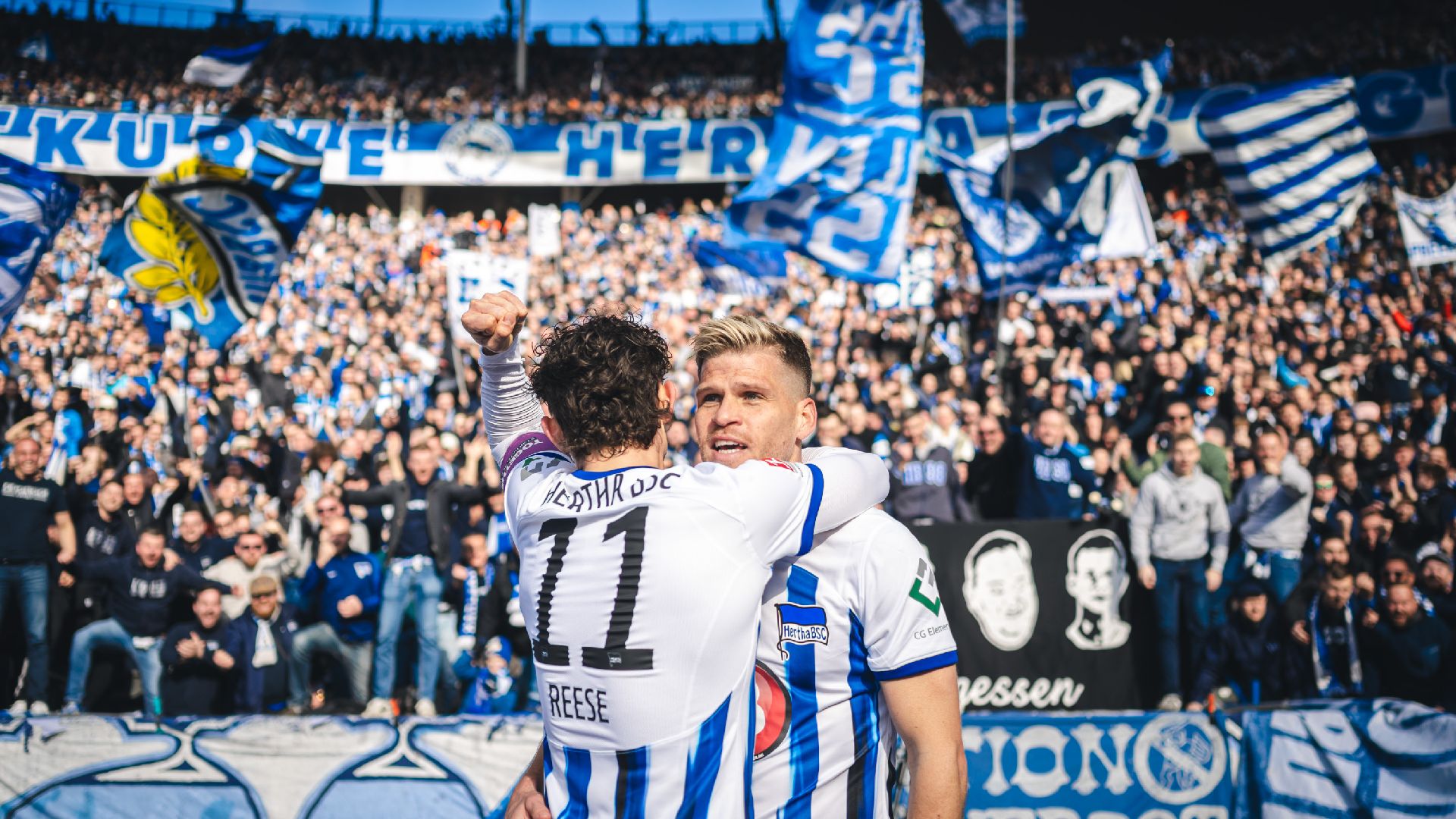 Fabian Reese embraces goalscorer Florian Niederlechner.