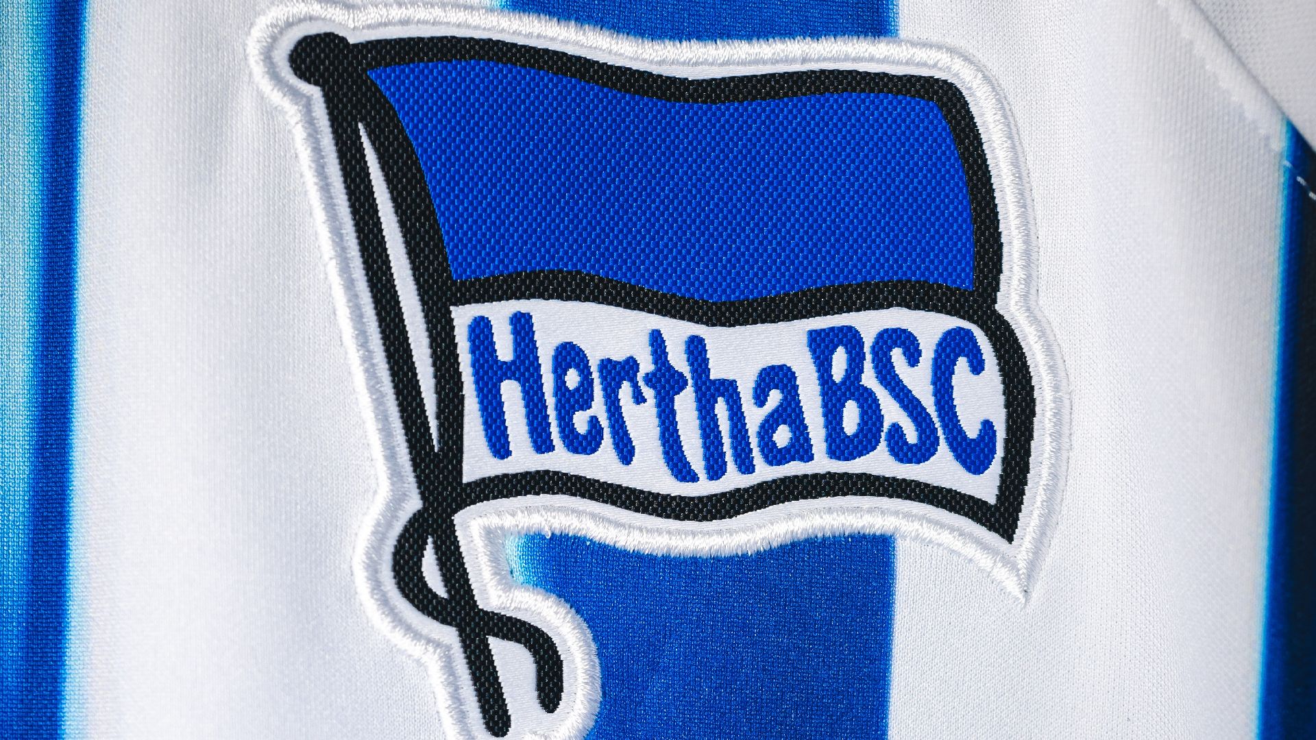 The Hertha badge on the club's home shirt.